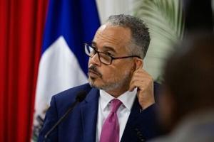 Haiti's transitional council hands power to PM