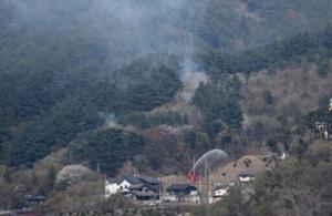 Hundreds of firefighters battle Japan forest blazes