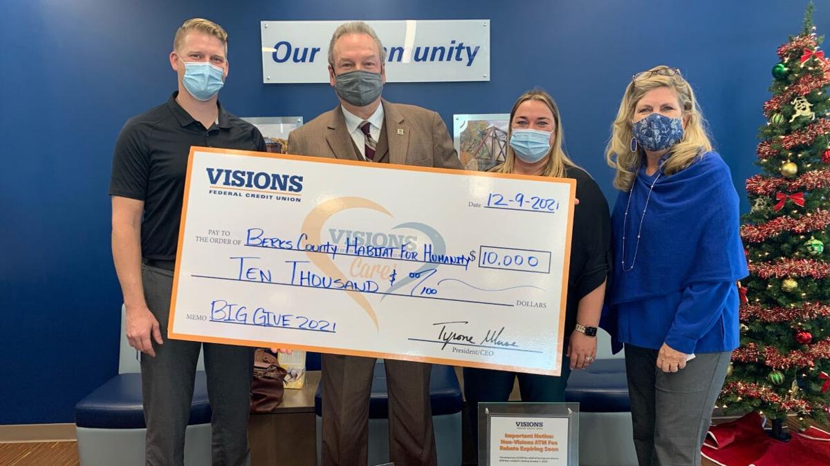 Visions FCU donates thousands to Habitat for Humanity ...