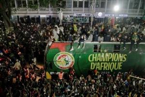 Senegal's 'historic' AFCON champs honoured with parade, presidential praise