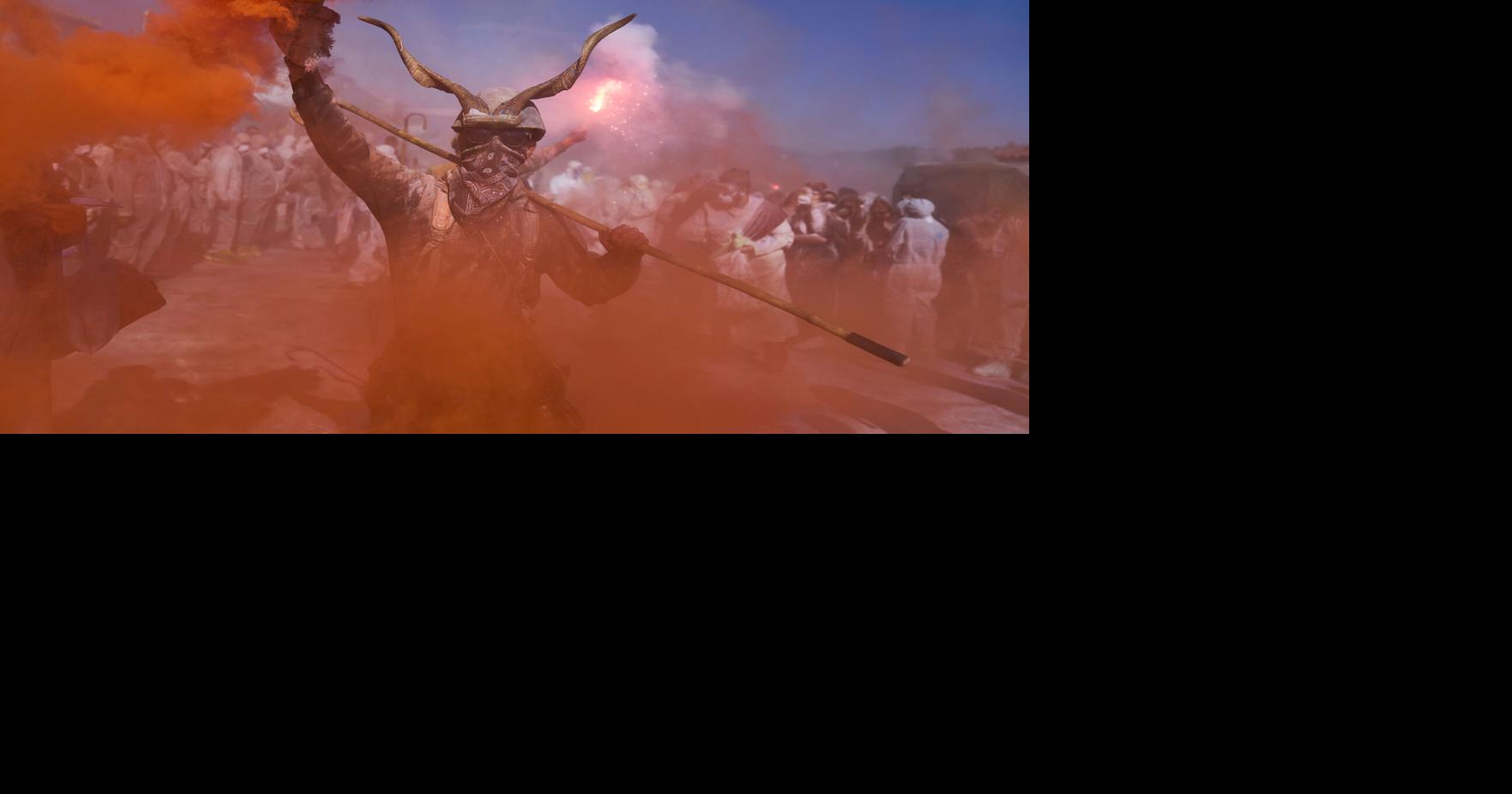 'Flour war' erupts in Greek seaside town as revelers celebrate the start of Lent