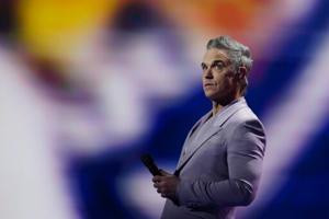 Robbie Williams tops Beatles for most number one albums in UK