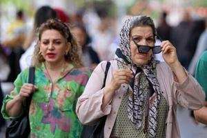 As some hijabs come off in Iran, restrictions still in place