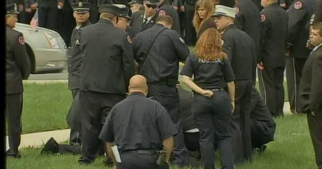 Law enforcement official collapses during Officer Robert Lasso funeral