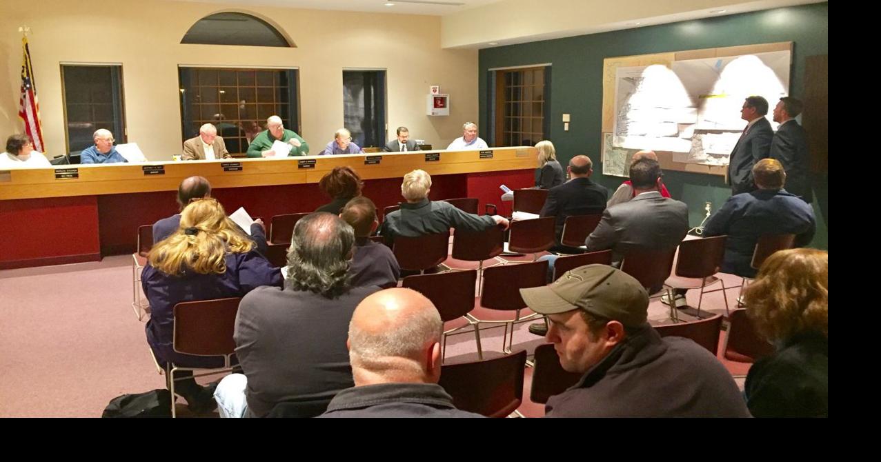 Officials table decision on parts of proposed Milford Village ...