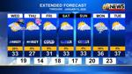 Few snow showers tonight; cold, breezy and mainly dry New Year's Day