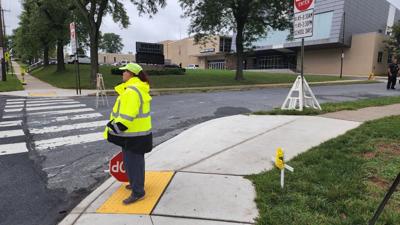 crossing guard in front of Dieruff High School after fatal pedestrian crash