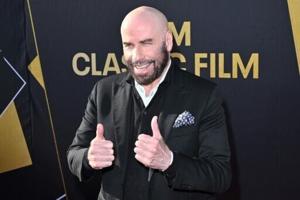 Travolta returns to Cannes with aviation-inspired directorial debut