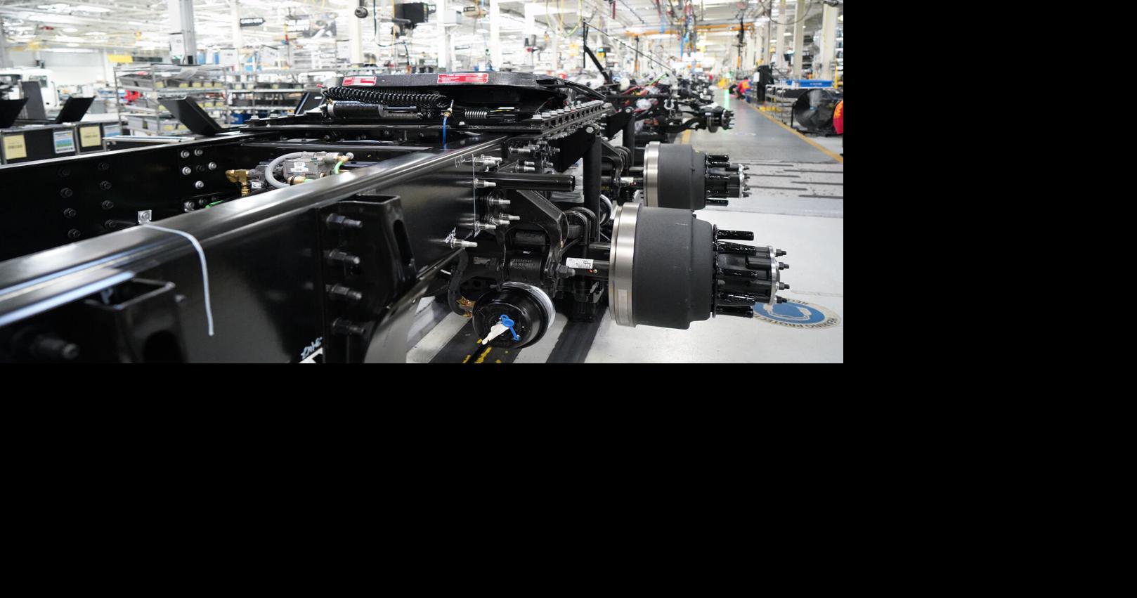 Mack Trucks' parent company trims forecast amid weakened truck market