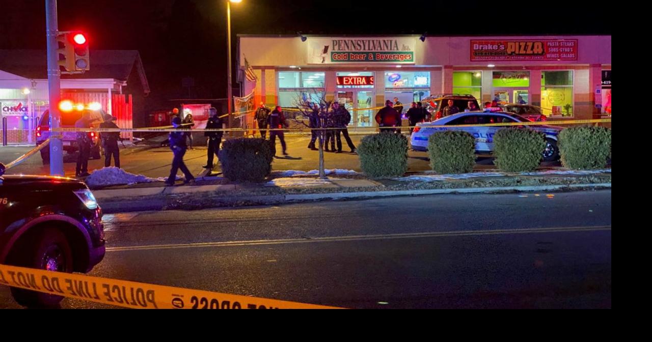 Allentown police close off strip mall set up crime scene tape after