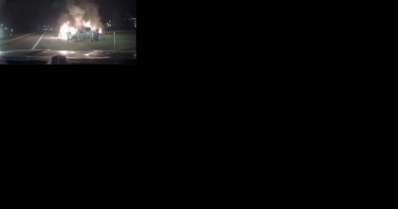 Caught on camera: Michigan police officer rescues woman from burning truck - Vimarsana News