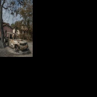 At least 200 homes were destroyed and two firemen killed in the fires