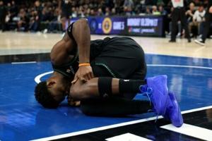 Timberwolves' Edwards, DiVincenzo exit playoff game with injuries