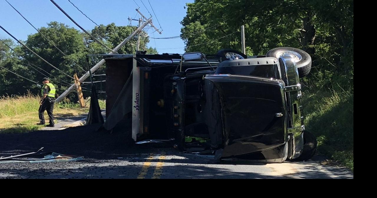 Overturned dump truck brings down pole, wires in Spring | Berks ...