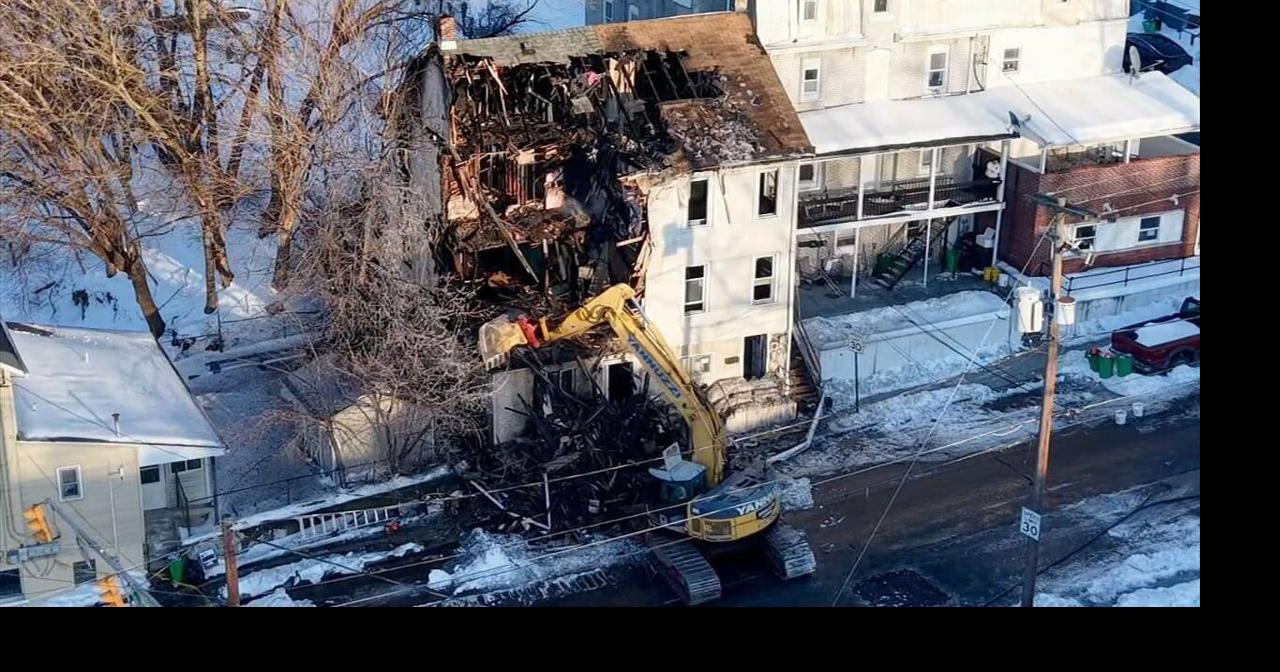 In Allentown, crews are tearing down a twin home after a fire tore ...