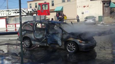Van erupts in flames; good Samaritans rush to driver's rescue