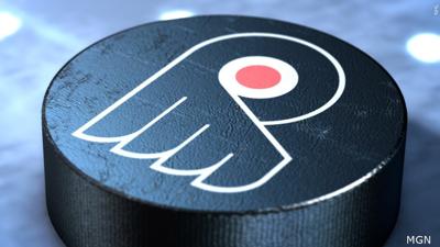 Philadelphia Flyers logo on ice hockey puck