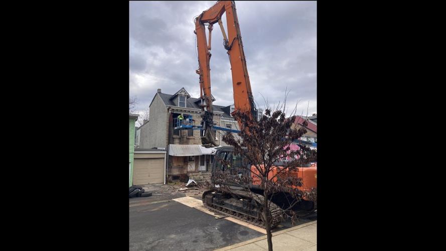 Demolition crew dismantles vacant Reading building after partial ...