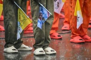 Fresh paint, careful choreography as pope visits African prison