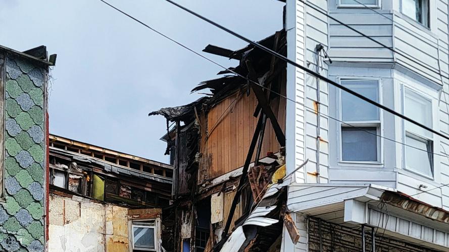 'So far behind the eight ball' Collapsed building, just one of many in danger of falling in