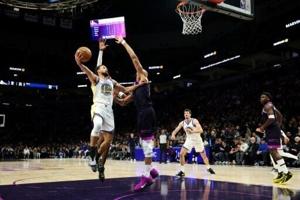 Curry leads Warriors over 'suffering' T'Wolves, Raptors silence Thunder