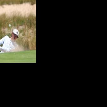 US 17-year-old Miles Russell, the youngest player in the 126th US Open, plays from a bunker during a practice round at