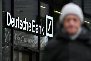 Deutsche Bank logs record profits, as new probe casts shadow