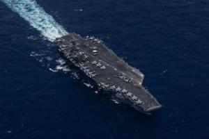 US pauses guiding ships through Hormuz, cites Iran deal hopes