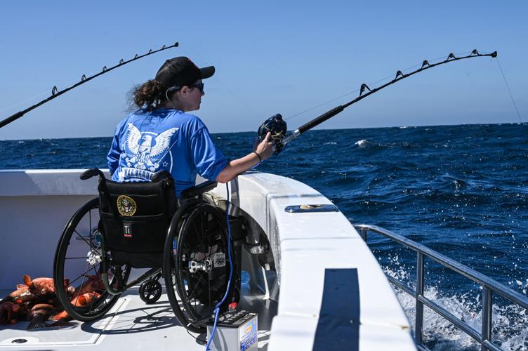 US Army Veteran Maggie Bilyeu fishes aboard the vessel "Bad Company 75" during the fifth annual War Heroes on Water transformative sportfishing tournament. In its largest tournament to-date, the event featured 50 of Southern California’s finest sportfis...