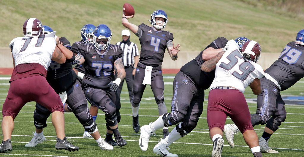 Wildcats' Marcum sets career record for passing TDs Article