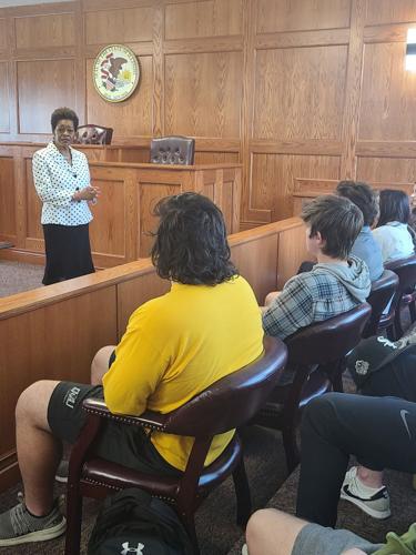 Illinois Supreme Court appellate justices speak to QU students