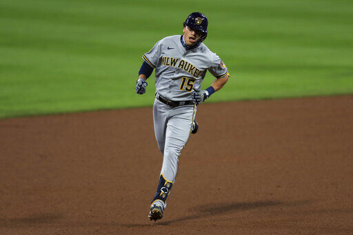 Milwaukee Brewers center fielder Tyrone Taylor (15) makes a catch