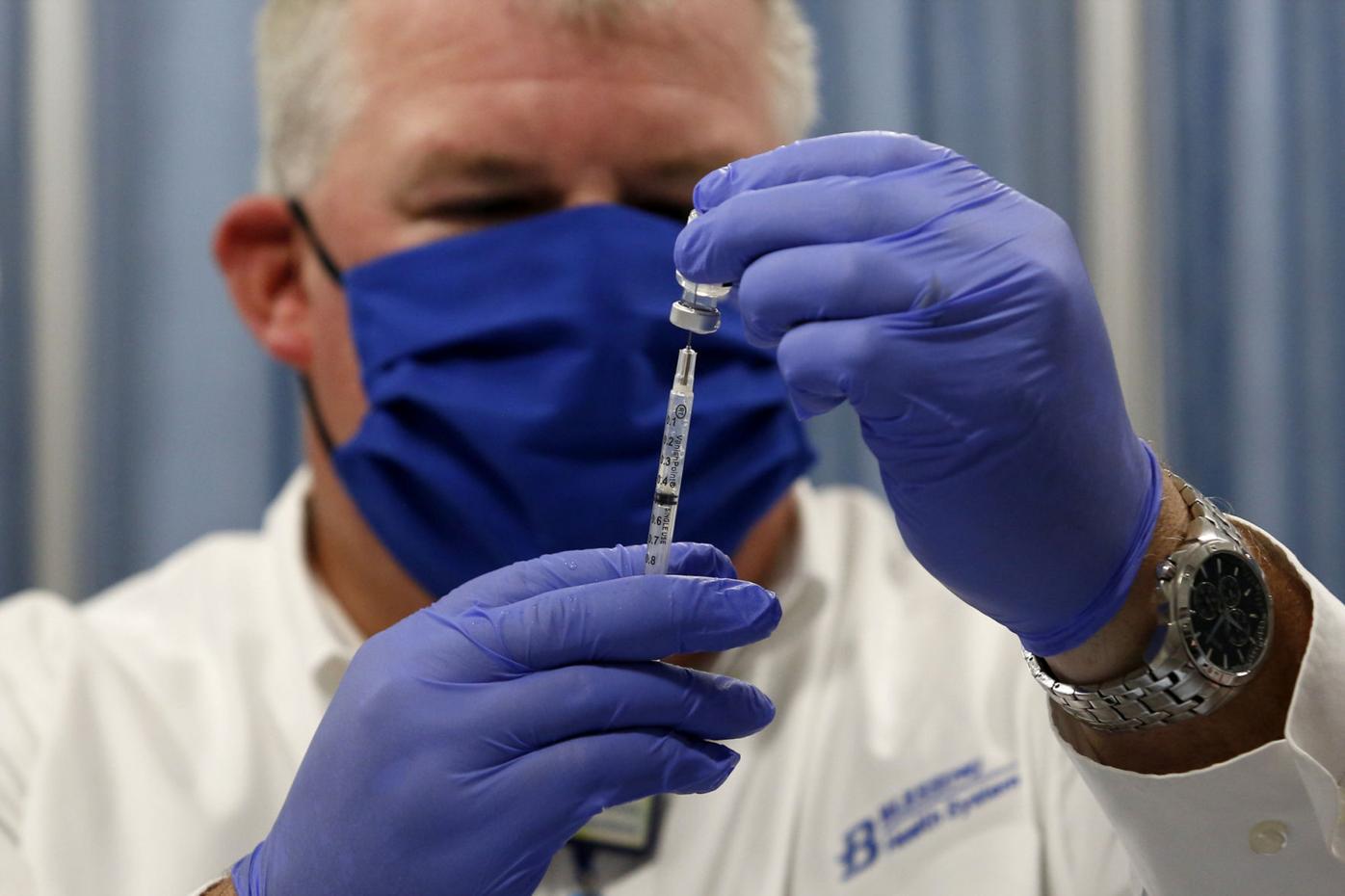 WEB 122420-qhw-blessingvaccines50A
