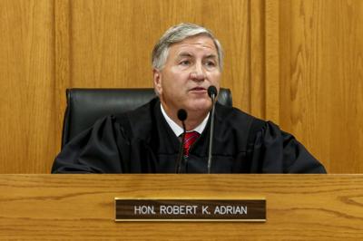 Judge Robert Adrian reassigned to civil cases