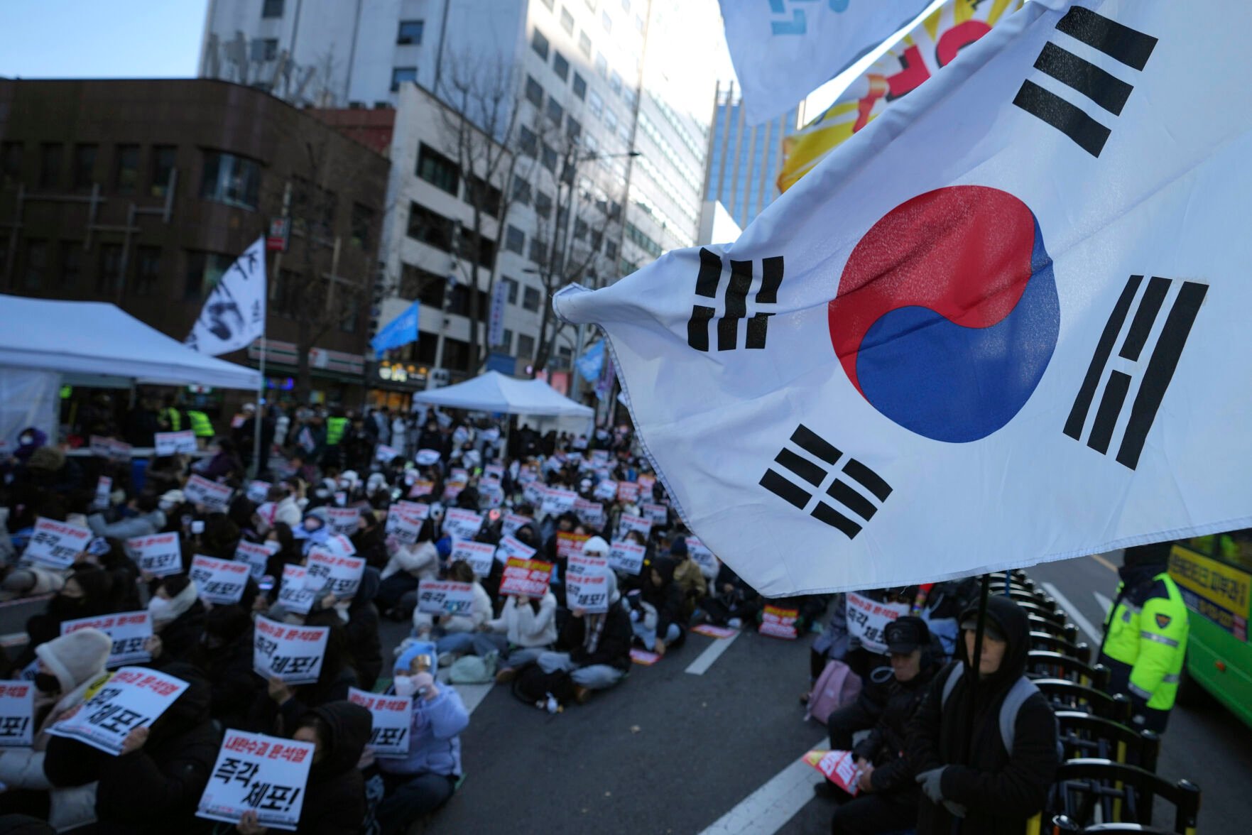 South Korea’s Impeached Leader Avoids Investigators As Court Begins ...