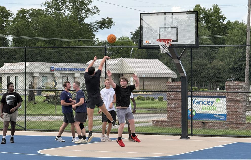 Lighted basketball courts now open at Yancey Park; dog park grand opening Tuesday
