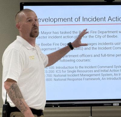 Beebe Volunteer Fire Department Battalion Chief Brian Mills presents plan