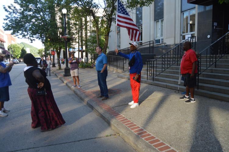 Protesters rally, march alongside police in Williamson News