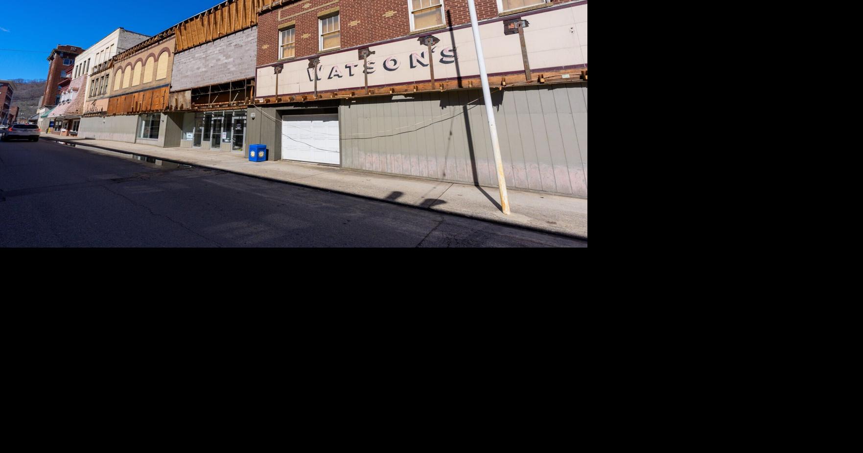 Old Watson's lettering revealed on downtown Logan building | News ...