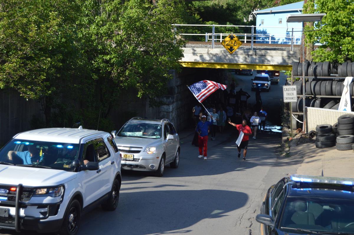 Protesters rally, march alongside police in Williamson News