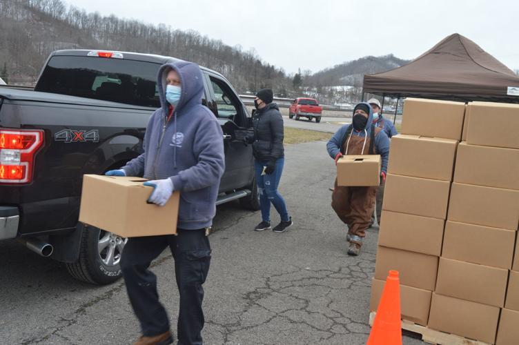 WHA hands out 36,000 lbs. of food and grocery items during giveaway News