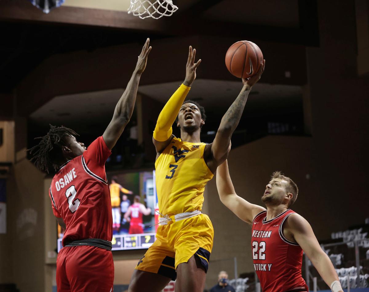 Wvu Basketball Mountaineers Beat Wku 70 64 Take Bad Boy Mowers Crossover Classic Title Sports Williamsondailynews Com