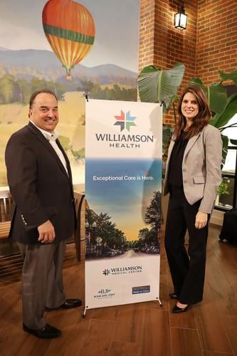 Williamson Health  CEO Phil Mazzuca and Michele Simpson, Director of Marketing and Communications unveil the new logo..JPG