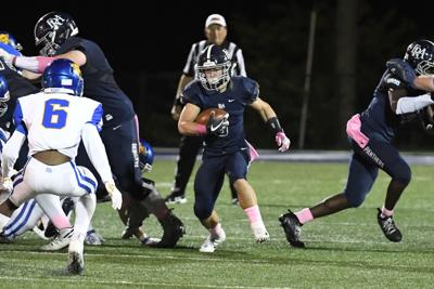 Football Vercher Fra Top Wildcats In Rainy Region Rivalry