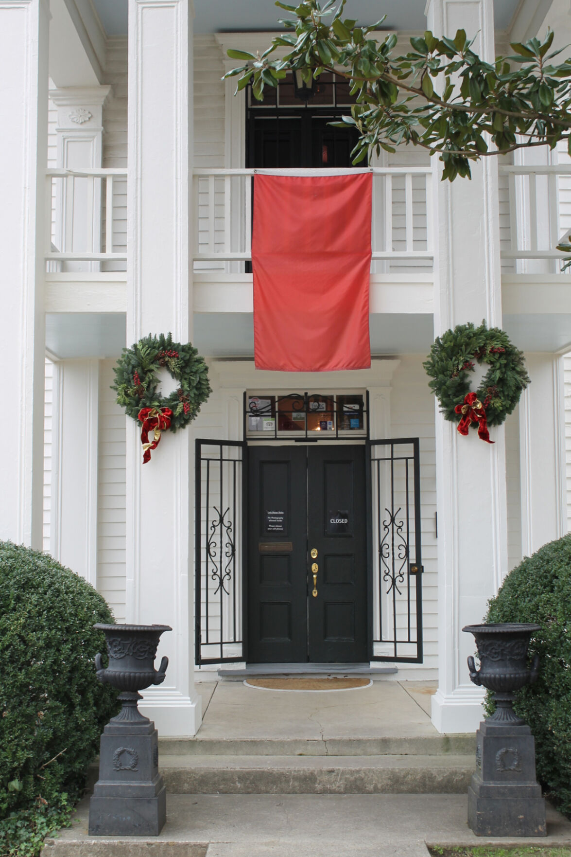 Lotz - Exterior with wreaths and flag.jpg