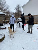PHOTOS: Spring Hill residents flock outside to experience unprecedented snowfall