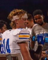 BGA football remembers courage of slain alums with designated jerseys