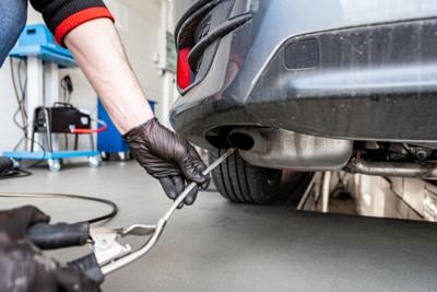 car inspection - car exhaust - exceeding the norm emissions testing