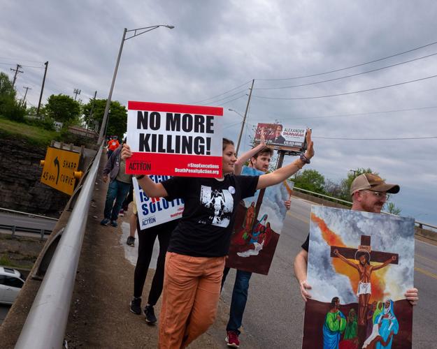 Anti-death-penalty protesters march through West Nashville on Easter Sunday