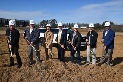 Kenny Martin, Rob Porter, Vickie Manning, Nelson Andrews, Mayor James Maness, Wayne Oakley and Tracy Cothran break ground at the site of the future Andrews Cadillac Mt Juliet..JPG